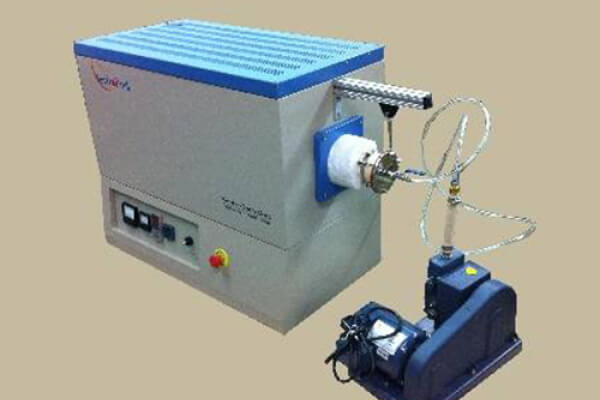 Bench-top tube furnace with attached vacuum pump for precision heating