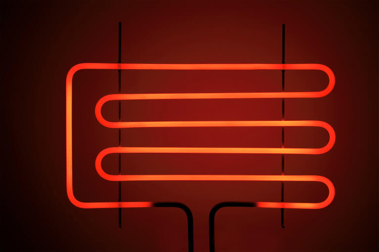 A glowing red-hot electric resistance heating coil used to illustrate industrial heating methods.